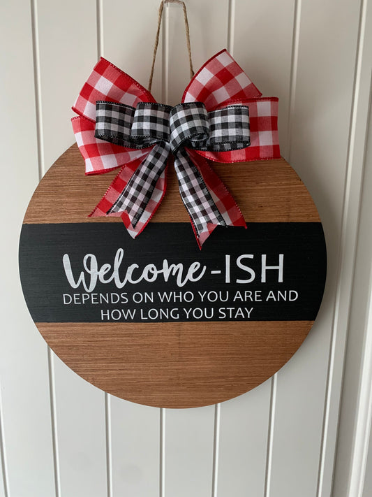 Welcom-ish wood sign.